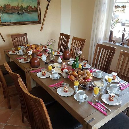 Cafe Hausnordlicht - Ferienwohnung 1 ดอร์นุม ภายนอก รูปภาพ